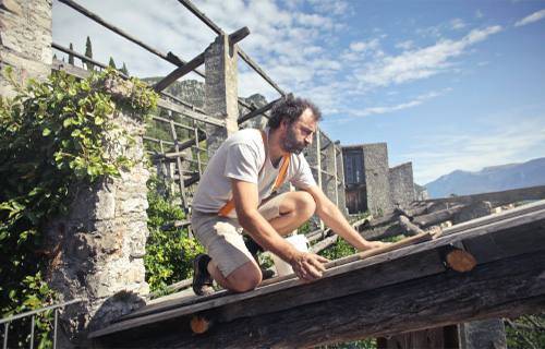 roofer and handyman working